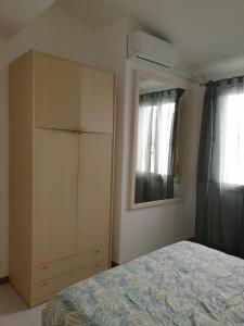 Postel nebo postele na pokoji v ubytování Casetta Donatello