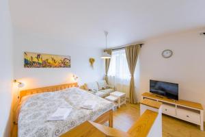 Posteľ alebo postele v izbe v ubytovaní Apartmány Lipno 46