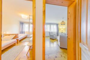 Posteľ alebo postele v izbe v ubytovaní Apartmány Lipno 46