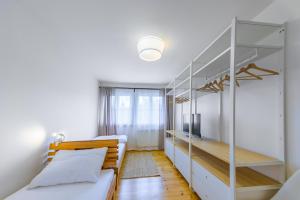 Posteľ alebo postele v izbe v ubytovaní Apartmány Lipno 46
