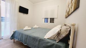 Postel nebo postele na pokoji v ubytování PIERI HOUSE CORFU