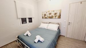 Postel nebo postele na pokoji v ubytování PIERI HOUSE CORFU