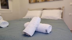 Postel nebo postele na pokoji v ubytování PIERI HOUSE CORFU
