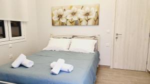 Postel nebo postele na pokoji v ubytování PIERI HOUSE CORFU