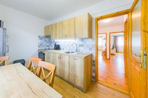 Kuchyňa alebo kuchynka v ubytovaní Apartmány Lipno 46