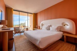 Cama ou camas em um quarto em Les Terrasses du Bailli