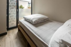 Giường trong phòng chung tại Destiny Student - Ardee Point