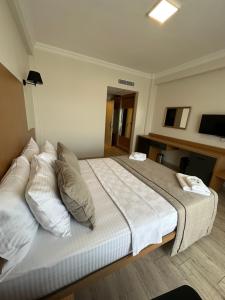 Postel nebo postele na pokoji v ubytování Nova Butik Hotel Çeşme
