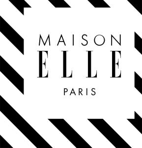 a black and white poster with the words manson french paris at Maison ELLE Paris in Paris