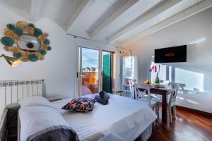 Фотография из галереи Casa Cosy suite Venini в Милане +13 фотографий