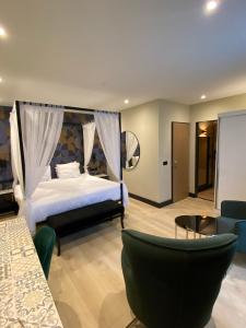 Postel nebo postele na pokoji v ubytování Alp de Veenen Hotel
