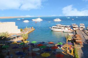 a view of a harbor with boats in the water at Shellghada Blue Beach in Hurghada