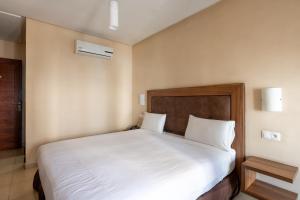 Uma cama ou camas num quarto em Hotel Etoile Du Nord