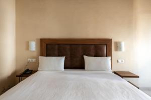 Uma cama ou camas num quarto em Hotel Etoile Du Nord