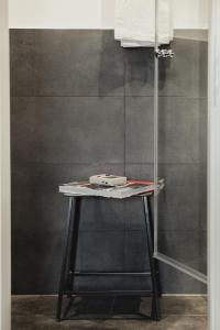 a table in a bathroom with a shower at Pyjama Park St. Pauli in Hamburg