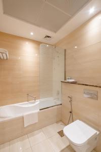 Koupelna v ubytování Peony Hotel