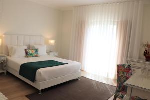 Cama ou camas em um quarto em Casa Da Padeira - Turismo Rural