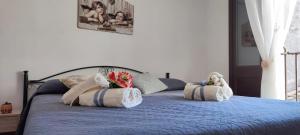 Posteľ alebo postele v izbe v ubytovaní Casa Vacanze dalla Nonnina