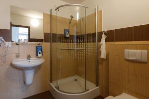 Ванна кімната в Litvan SUNSET Apartments