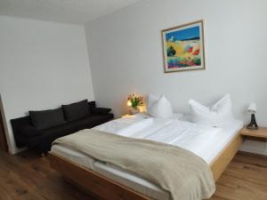 Postel nebo postele na pokoji v ubytování Hotel Sonnenkeller