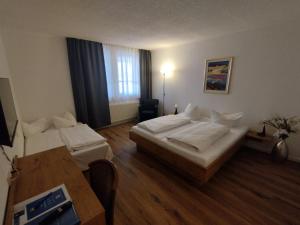 Postel nebo postele na pokoji v ubytování Hotel Sonnenkeller
