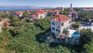 an aerial view of a house in a village at Villa Serena in Mirce
