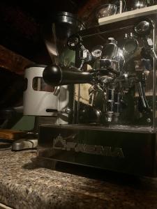 a machine sitting on top of a counter at La Dolce Vita in Levanto +14 photos