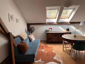 Posedenie v ubytovaní Appartement Vieille Ville + 3 fotografie