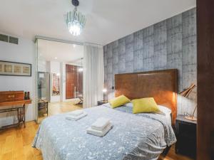 Posteľ alebo postele v izbe v ubytovaní Cubo's Apartamento 33 Carreteria 3B + 37 fotografií