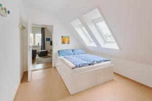 En eller flere senge i et værelse på Ferienwohnung Fährnah Moba-Travel