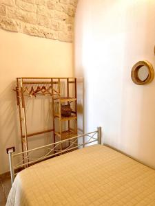 Postel nebo postele na pokoji v ubytování Domus Petra 104