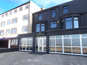 a hotel building with a lot of windows at Blackpool Resort Hotel in Blackpool