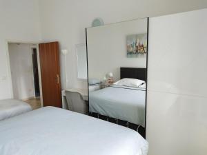 Posteľ alebo postele v izbe v ubytovaní Apartments Proto