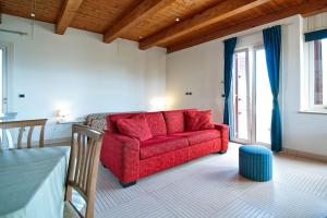 A seating area at SARI CASA VACANZE