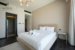 Postel nebo postele na pokoji v ubytování Mira Holiday Homes - Fully furnished 1 bedroom with balcony