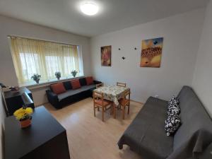 A seating area at Apartman Michaela