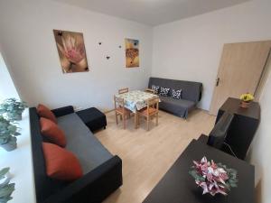 A seating area at Apartman Michaela