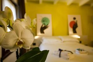 Postel nebo postele na pokoji v ubytování Appartamento immerso nella natura con parcheggio - Primula