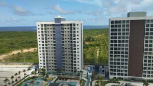 an aerial view of two tall buildings at Salinas Premium Resort in Salinópolis