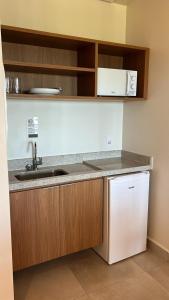 Kuchyň nebo kuchyňský kout v ubytování Salinas Premium Resort