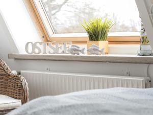 Postel nebo postele na pokoji v ubytování Ferienwohnung Dons