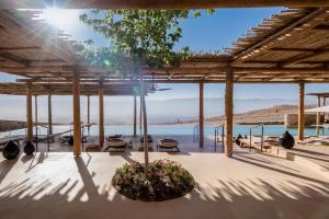 a patio with a view of the water at Six Senses Shaharut in Shaharut