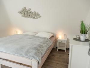 Postel nebo postele na pokoji v ubytování Ferienwohnung Dons
