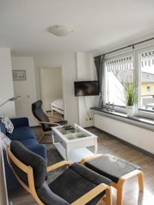 TV a/nebo společenská místnost v ubytování Ferienwohnung Dons