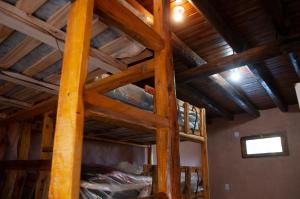 Postel nebo postele na pokoji v ubytování KONDUR ELEMENTOS ECO HOSTEL