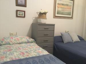 Łóżko lub łóżka w pokoju w obiekcie Apto Calpe con piscina. No uses coche vacaciones.
