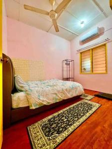 Krevet ili kreveti u jedinici u okviru objekta Casa Budi Premium 4BR Home @ P Chepa Kota Bharu