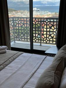 Postel nebo postele na pokoji v ubytování Nova Butik Hotel Çeşme