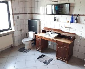 Koupelna v ubytování Gästehaus Möbius + 13 fotografií