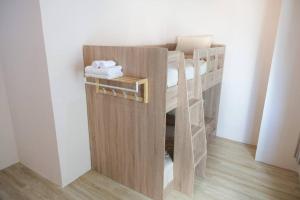 Postel nebo postele na pokoji v ubytování 2BR minimal mu-ji style 130SQM ~